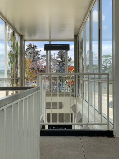 A piece of custom glass artwork designed by Francesco Simeti and printed on glass by Skyline Design architectural glass manufacturer and installed at CTA Addison Blue Line Train Station