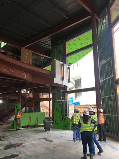 Ongoing custom glass construction on the exterior wall of Lenexa City Center Library by Skyline Design, the industry-leading architectural glass manufacturer.