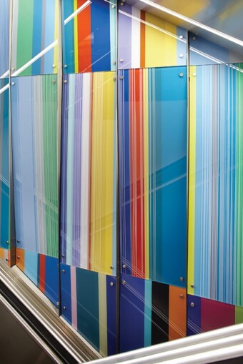 A linear and geometric custom glass pattern designed by Anne Lindberg and printed on the glass partition of Richard Bolling Federal Building by Skyline Design, the industry-leading architectural glass manufacturer.